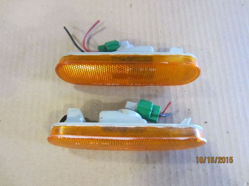 2 small signal lamp (flasher) right and left mazda protege 1995-1996