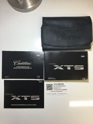 2015 cadillac xts owners manual set w/leather case. free priority s&amp;h #0478