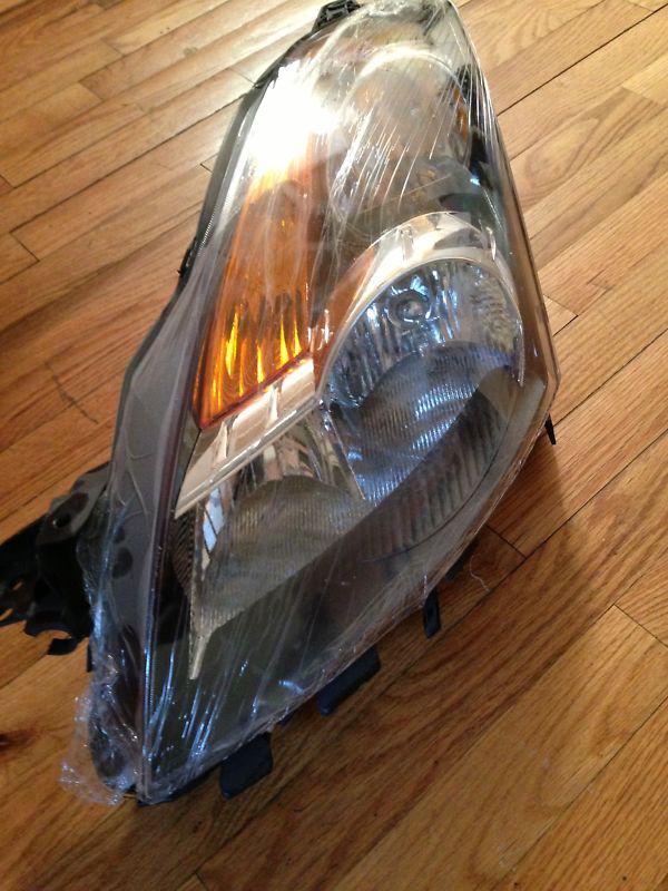 08-09 nissan altima coupe driver's side front light assembly 