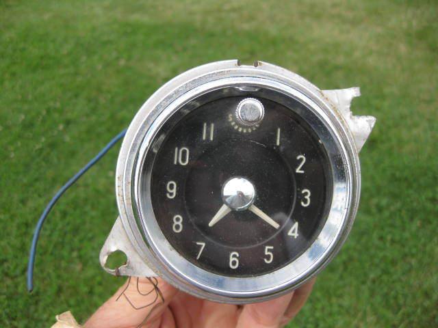 1955 pontiac clock/original