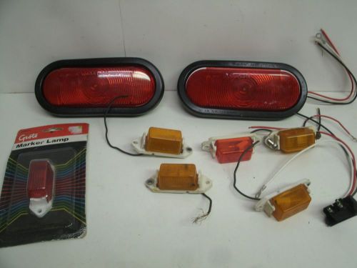 2 truck-lite red super 60 oval stop/turn/tail lamp + marker lamps