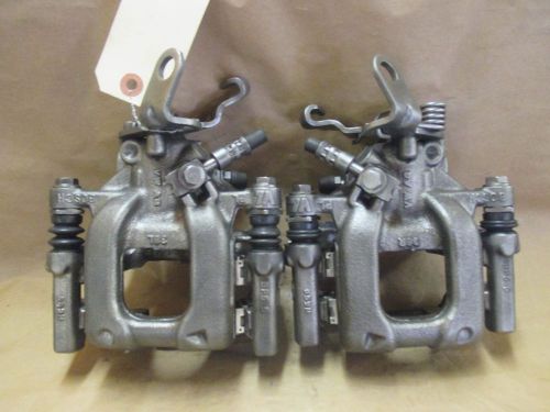 Pull off rear brake caliper set l&amp;r 141.33641/642 various 09-14 volkswagen audi