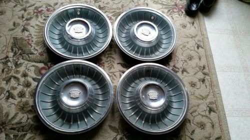 1961 cadillac hubcaps set of 4