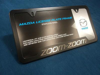 New oem mazda black stainless steel zoom zoom license plate frame 0000-83-z22