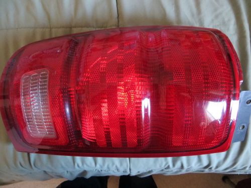 Back tail lights housing for a 1998 ford expedition. a pair