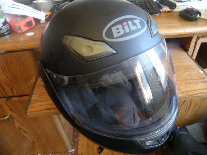 Motorcycle helmet  bilt medium, street, sport bike, flip up visor and front. 