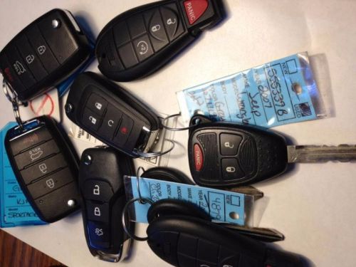 Locksmith lot # 4/ 7 mixed oem smart remote transmitters genuine factory specs