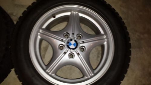 Bmw z3 two wheels w/snows mounted &amp; one new summer tire