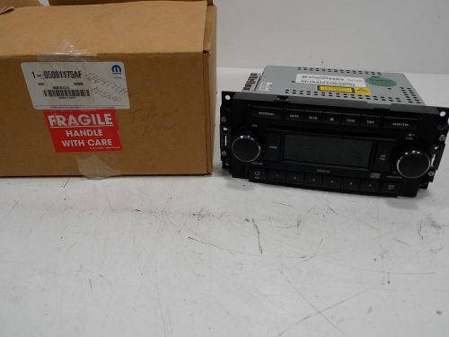 New dealer take out genuine oem dodge chrysler jeep cd radio p05064171ak