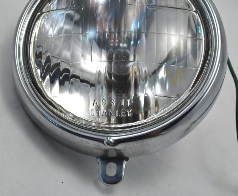 Stanley headlight p/n: 6-0101a (6 volt new headlight w/ chrome trim)