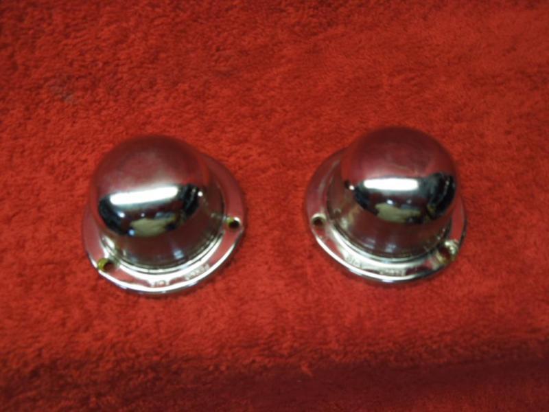 Pair of perko a-16 chrome light covers in fair condition