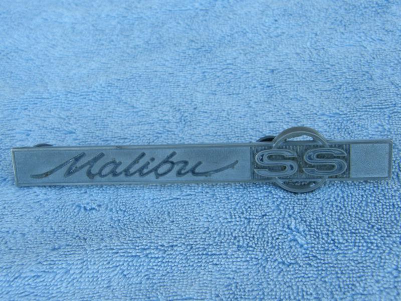 1965 malibu ss chevelle trunk emblem gm#4492586 with rubber grommets free ship48