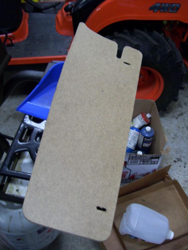 Mustang trunk filler board with screws