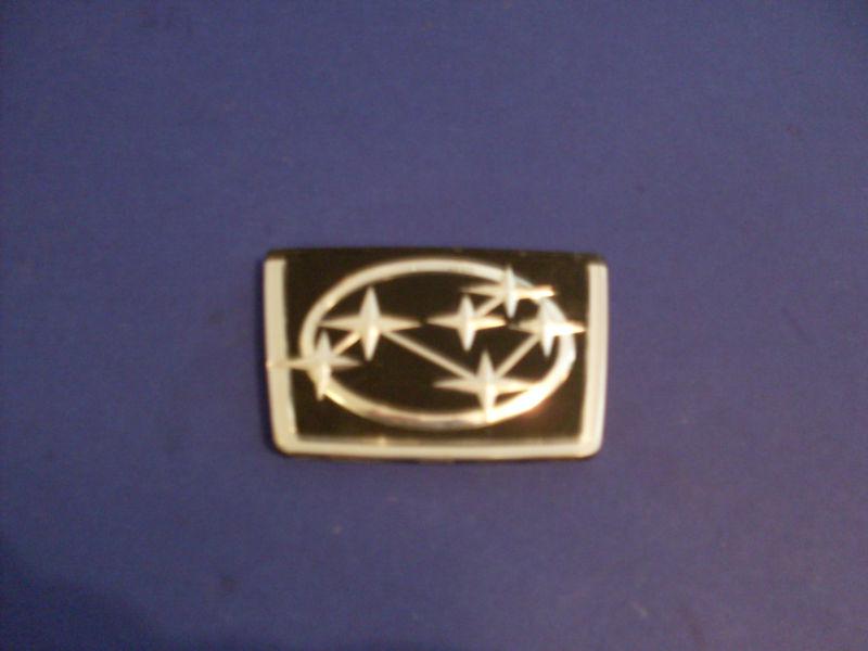 1996 subaru outback/front grill logo emblem/measures/3"x1"7/8/glue down type.