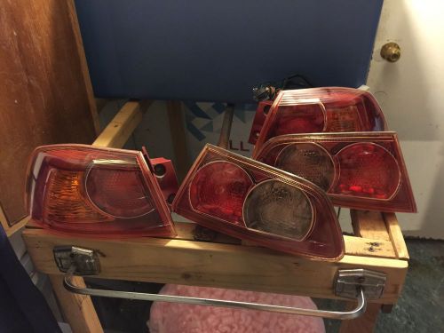 08-present lancer oem taillights in red clear