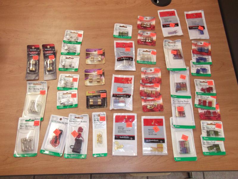 Large lot of radioshack automotive / car fuses / fuse holders, 40 packages