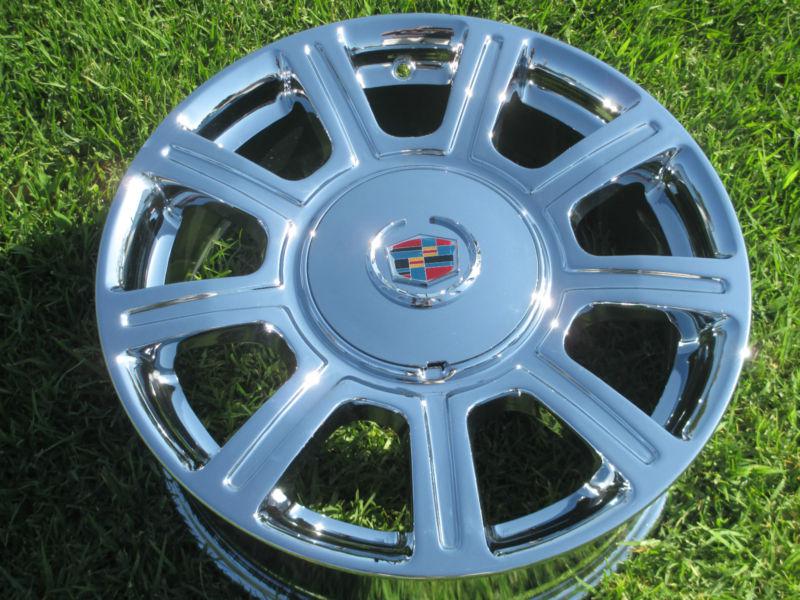 17" 4- new cadillac dts oem chrome wheels/rims-exchange