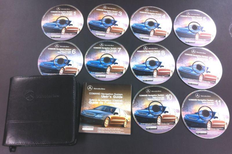 2002 mercedes benz  navigation set of  10 cd's w/leather case