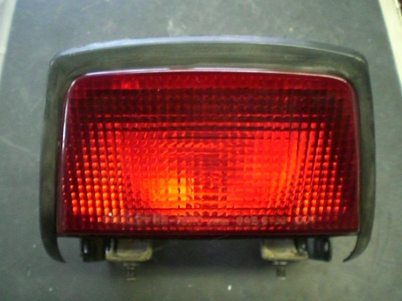 Used 1984-1985 honda vf500c v30 magna rear tail light and mounting bracket