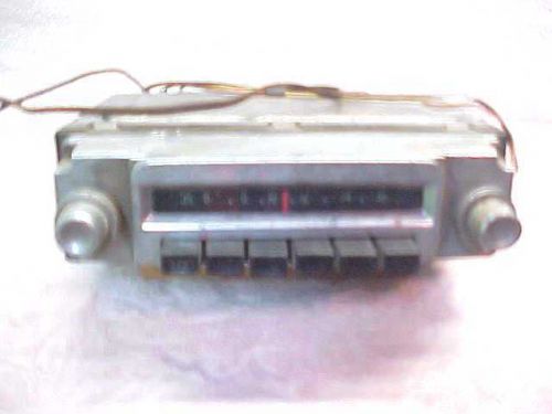 56 plymouth am radio - plays well - mopar model 841