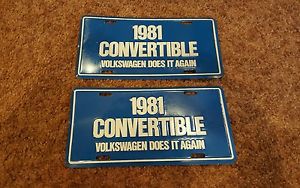 Two (2) vw embossed dealer showroom plate 1981 convertible vw does it again
