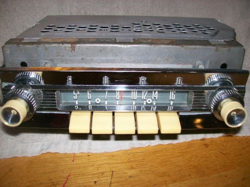 Nice 1959-ford factory push button radio repaired and working 57-58