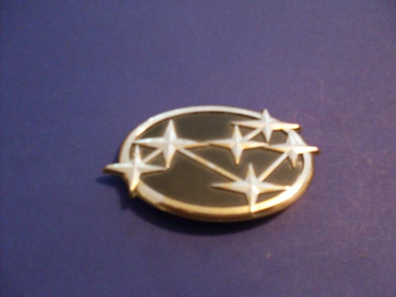 1980,s subaru/front or rear logo emblem/measures 4"1/16x2"5/8/6 stars in a group