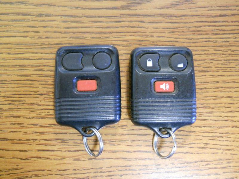 Pair of ford lincoln mercury keyless remote cwtwb1u331 2l3t-15k601-aa