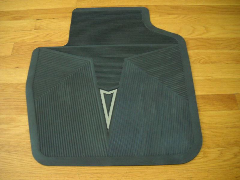 A used 1964-1972 pontiac gto/tempest/lemans blue passenger side rear floor mat 