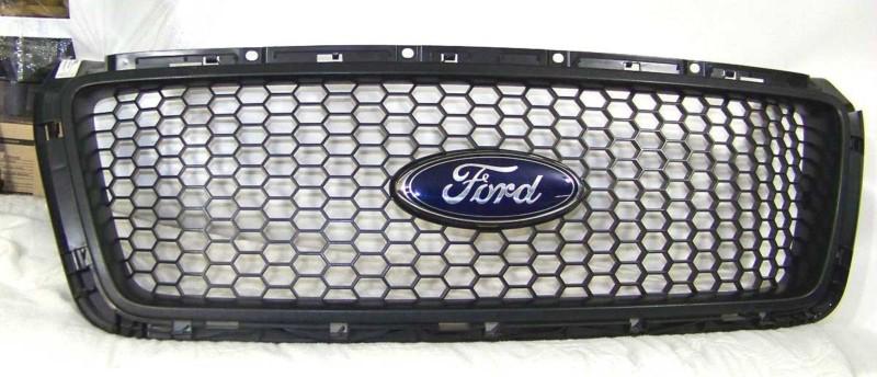 2007 ford 150 vermillion/honeycomb grill with logo nice