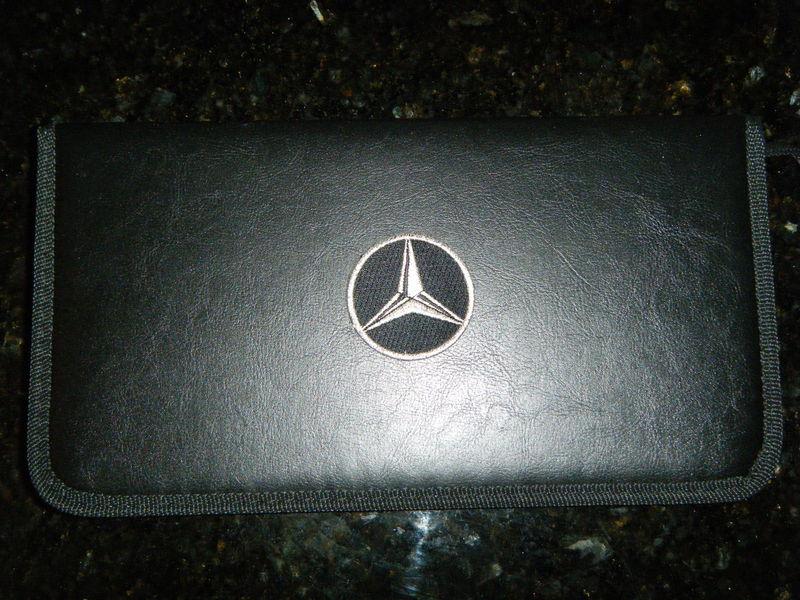 Mercedes benz  cd case wallet holder -  holds 48 cds or dvds -  auto car racing