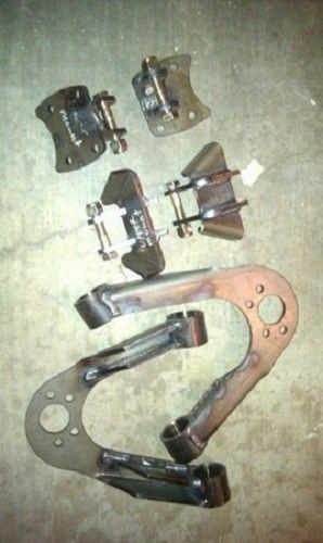 Front coilover conversion brackets for nissan pickup
