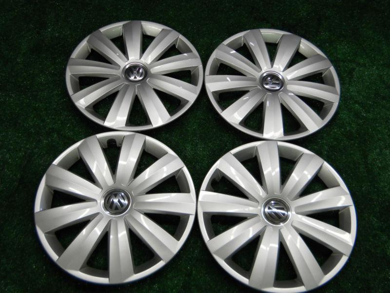 Four 16" vw jetta/golf/passat 2013 original factory wheel cover hub caps