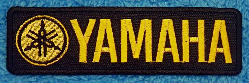 Yamaha  embroidered  sew on or iron on  patch - black & golden orange