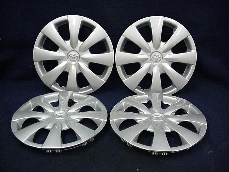Toyota corolla 09-13 15" 8 spoke silver wheel covers / hubcaps - set of 4 - oem