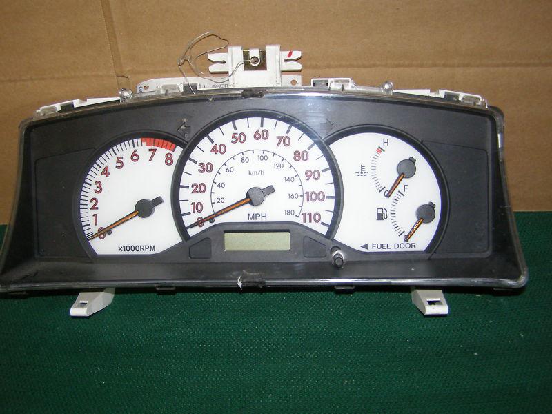 2003 2004 toyota corolla speedometer cluster  white face, red numbers 