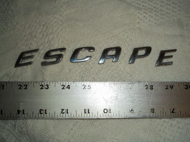 2001 ford escape individual letters spell "escape" logo from rear hatch emblem