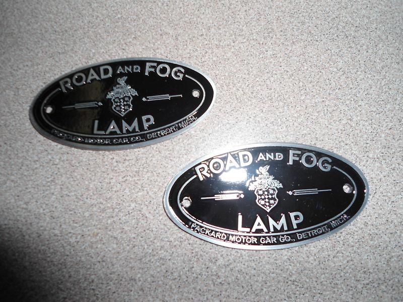 Packard, fog and driving light badges