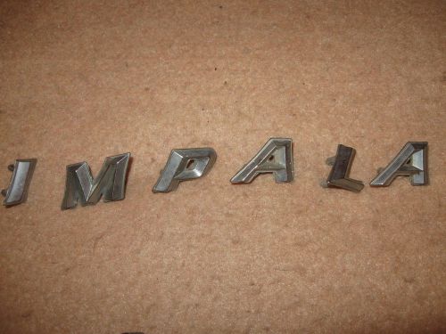 1959 chevy impala 2 door hardtop rear quarter letters spelling out impala