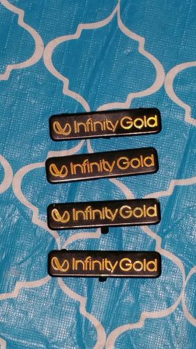Oem 96 - 01 jeep grand cherokee &#034;infinity gold&#034; nameplate emblem pair badges