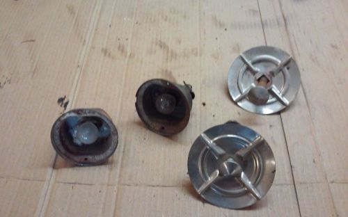 1957 chevy front bumper bullet inserts with bolts and turn light housings