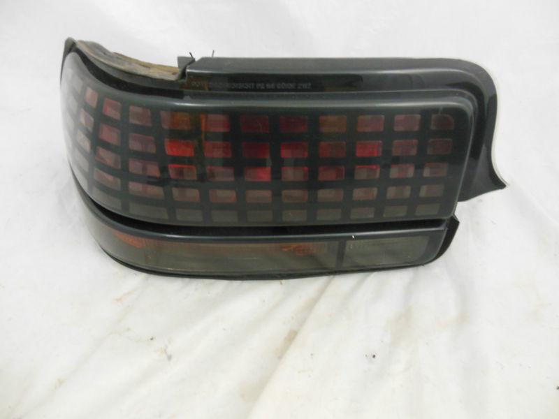  94 95 96 grand prix sedan  left driver side taillight oem 2 mount studs bad 