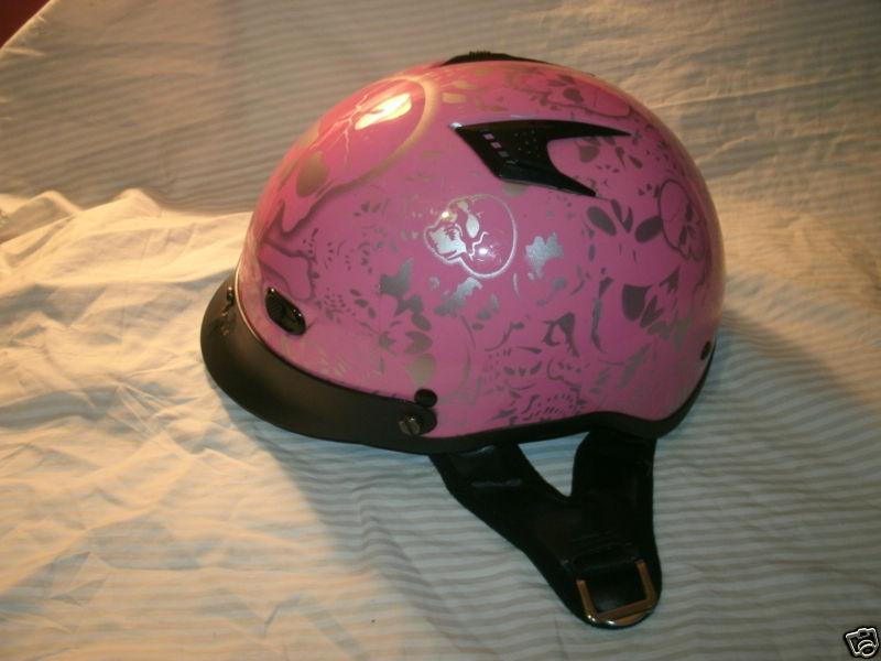 A pink harley davidson helmet