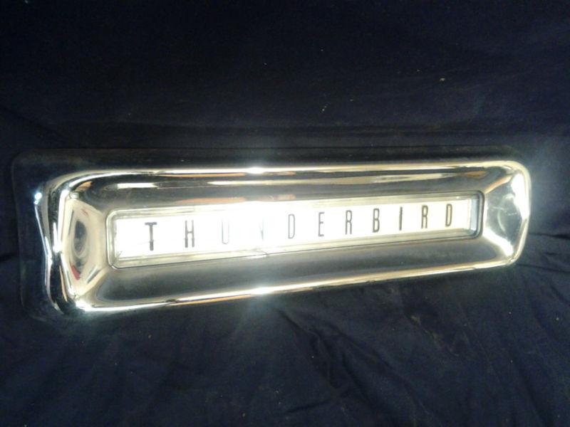 1964 ford thunderbird rear5 bumper center script ornament