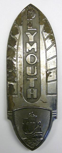 Original 1942 plymouth badge rear deck antique genuine mopar mounts intact 