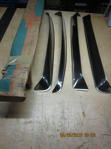 1957 chevy vent shades nos