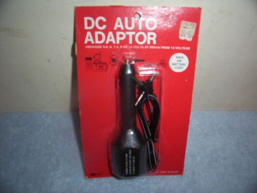Vintage kmart 4-way output plug dc auto adapter 06-39-47 new in package