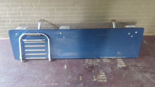 Full blue fiberglass swim platform with brackets ladder