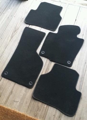 New vw passat floor mats black complete set (dated 2006) genuine volkswagen