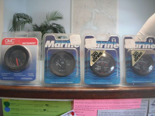 4 marine gauges- omc-teleflex- trim/tilt. volt. oil pressure
